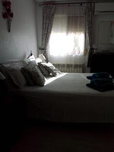 Säng eller sängar i ett rum på Villa Nobotha