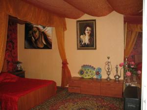 Säng eller sängar i ett rum på Holiday Home na Naberezhnoy