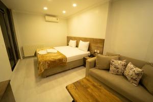 A bed or beds in a room at Zin Hotel İstanbul