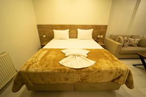 A bed or beds in a room at Zin Hotel İstanbul