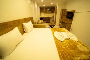 A bed or beds in a room at Zin Hotel İstanbul