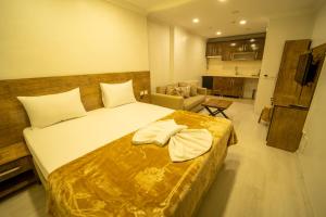 A bed or beds in a room at Zin Hotel İstanbul