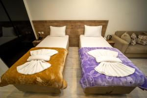 A bed or beds in a room at Zin Hotel İstanbul