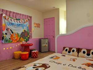 Letto o letti in una camera di 墾丁舍廷親子會館 KT13 Hotel