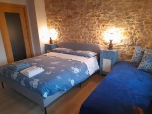 Postel nebo postele na pokoji v ubytování Casa 1885