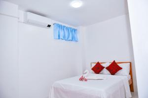 Postel nebo postele na pokoji v ubytování Hotel Don Raul