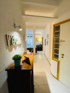 A bed or beds in a room at Apartments Plaza Mayor