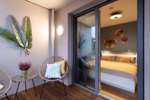Postel nebo postele na pokoji v ubytování SweetHomes Dresden