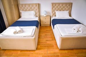 Postel nebo postele na pokoji v ubytování Hotel Jurgen