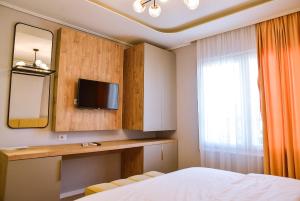 TV a/nebo společenská místnost v ubytování Hotel Jurgen
