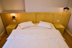 Postel nebo postele na pokoji v ubytování Hotel Jurgen