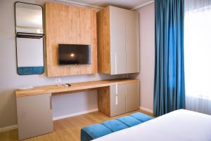 TV a/nebo společenská místnost v ubytování Hotel Jurgen
