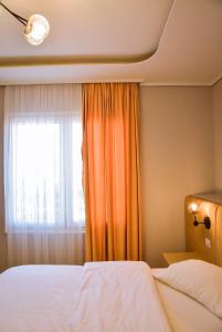 Postel nebo postele na pokoji v ubytování Hotel Jurgen