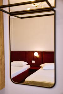 Postel nebo postele na pokoji v ubytování Hotel Jurgen