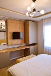 TV a/nebo společenská místnost v ubytování Hotel Jurgen