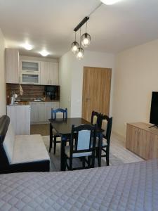 A kitchen or kitchenette at Borovets Gardens Apartment A27