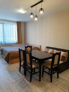 A seating area at Borovets Gardens Apartment A27