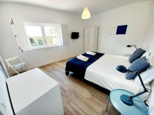 Ένα ή περισσότερα κρεβάτια σε δωμάτιο στο Casa do Tonel +32 φωτογραφίες