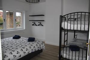 Postel nebo postele na pokoji v ubytování Vakantiewoning 't Kartuis, Brugge