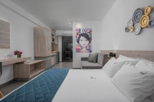 Postel nebo postele na pokoji v ubytování Dandelion Suites