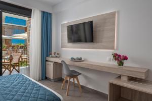 TV a/nebo společenská místnost v ubytování Dandelion Suites