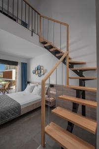 Postel nebo postele na pokoji v ubytování Dandelion Suites