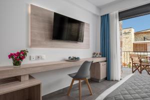 TV a/nebo společenská místnost v ubytování Dandelion Suites