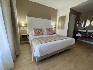 Cama o camas de una habitación en Añoreta Suites