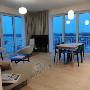 Posezení v ubytování Luksusowe apartamenty widokowe, Darłówko