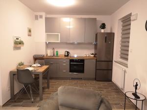 Kuchyň nebo kuchyňský kout v ubytování Apartament Marzenie 2 - Opole