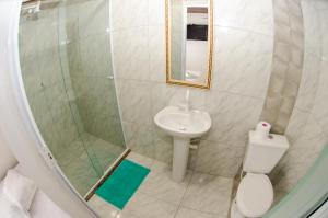 Koupelna v ubytování Suítes Recanto das Orquídeas