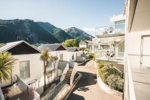 an apartment balcony with a view of the mountains at Blue Peaks Apartments in Queenstown