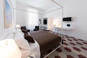 TV a/nebo společenská místnost v ubytování Rhegion B&B