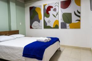 Postel nebo postele na pokoji v ubytování M1145 Aparta Loft