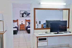 TV a/nebo společenská místnost v ubytování Central Park Motel