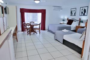 Postel nebo postele na pokoji v ubytování Central Park Motel