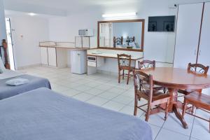 Kuchyň nebo kuchyňský kout v ubytování Central Park Motel