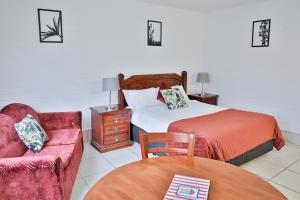 Postel nebo postele na pokoji v ubytování Central Park Motel