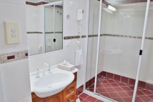 Koupelna v ubytování Central Park Motel