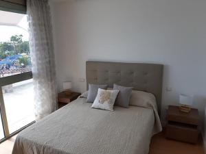 Postel nebo postele na pokoji v ubytování Beachfront Loft in Puerto de Mogan