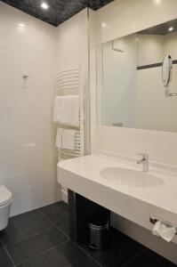 Koupelna v ubytování Garni Hotel Alber
