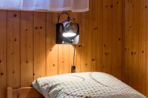 Postel nebo postele na pokoji v ubytování Chalet Sunnegga