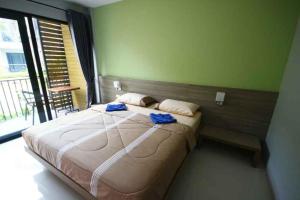Postel nebo postele na pokoji v ubytování Phumi Resort