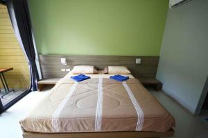 Postel nebo postele na pokoji v ubytování Phumi Resort