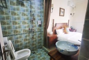 Ванна кімната в Shenzhen Xichong beach Lanting Homestay