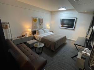 Ένα ή περισσότερα κρεβάτια σε δωμάτιο στο JS Boutique Hotel