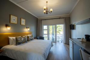 Postel nebo postele na pokoji v ubytování Fairy Knowe Hotel