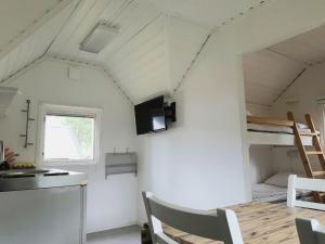 A kitchen or kitchenette at First Camp Duse Udde - Säffle