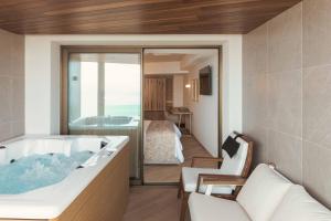 Posteľ alebo postele v izbe v ubytovaní BIO BEACH Boutique Hotel - Adults Only