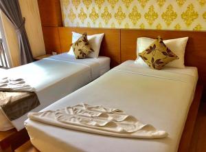 Letto o letti in una camera di Andaman Resort